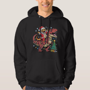 Excited Santa Lizard Riding T-Rex Hoodie