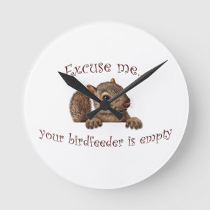 Excuse me...your birdfeeder is empty round clock