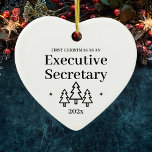 Executive Secretary First Christmas Ceramic Ornament<br><div class="desc">First Christmas as an executive secretary heart ornament. Elegant porcelain ceramic holiday ornaments in white with black lettering. Featuring Christmas trees and stars.</div>