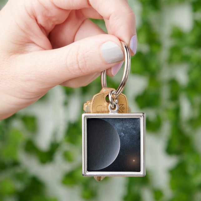 Exoplanet Ogle-2016-Blg-1195lb Orbits A Small Star Keychain (Hand)