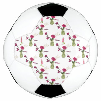 Exotic flower arrangement in glass soccer ball