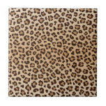 Exotic Leopard print pattern design Tile<br><div class="desc">Leopard print pattern with irregular dark brown spots on a light beige background. The design creates a wild and exotic aesthetic.</div>