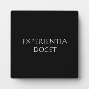 Experientia docet plaque