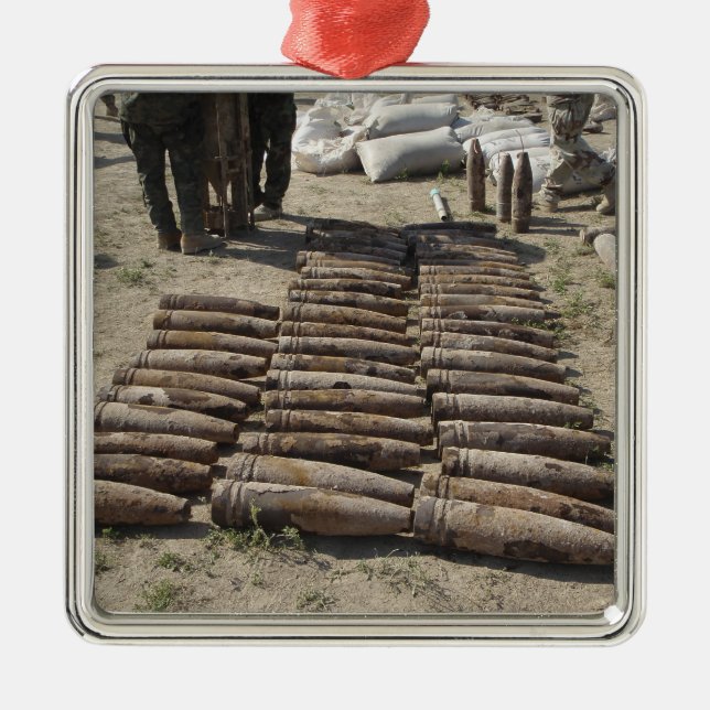 Explosive devices are identified and inventorie metal ornament (Front)