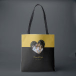 Eye-casing Heart Couple Gold and Black Tote Bag<br><div class="desc">Carry style and romance with this eye-casing heart couple tote bag in gold and black. Featuring a bold design,  it’s perfect for everyday use,  shopping,  or gifting. Durable and spacious,  it blends practicality with modern,  expressive fashion for a standout accessory.</div>