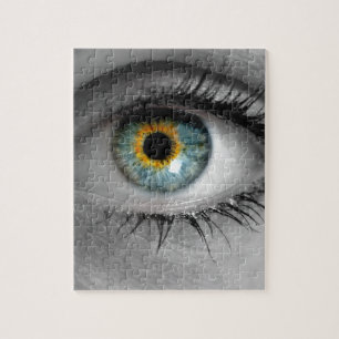 Eye looks to viewer concept macro jigsaw puzzle