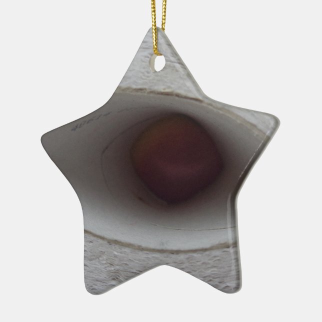eye shaped hole, made of paper ceramic ornament (Left)
