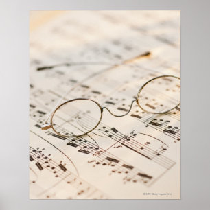 Eyeglasses on Sheet Music Poster