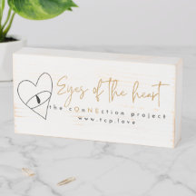 Eyes of the heart wood sign