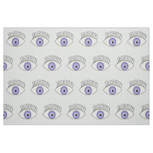 Eyes on blue fabric