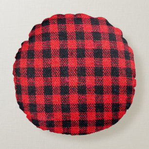 Fabric texture with grid pattern, red squares and round pillow