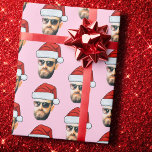 Face Santa Hat Christmas Gift Wrapping Paper<br><div class="desc">Face Santa Hat Christmas Gift Wrap, Replace the face with your favorite photo if you want (make sure to crop as much to the face as possible and use an app to remove the background) and personalize this funny Christmas Holiday Wrapping Paper with your kid, husband, or boyfriend on it!...</div>