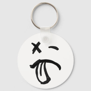 Face with Black Eye and Tongue Sticking Out Keychain