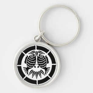 Facing sea breams in bamboo circle keychain