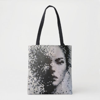 Fading grayscale pixel portrait with emotion tote bag