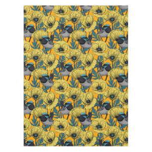 Fairy wren and poppies in yellow tablecloth