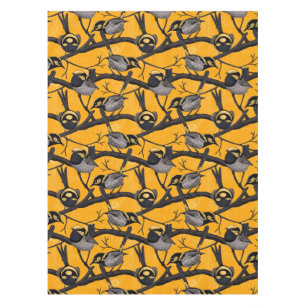 Fairy wrens in yellow tablecloth