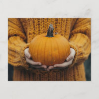 fall greeting card with woman holding a pumpkin
