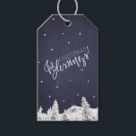 Falling Snow Navy White Christmas Blessings Script Gift Tags<br><div class="desc">Elegant chic winter seasonal dark midnight blue and white gift tag featuring a winter mountains scene with pine trees,  falling snow and "Christmas Blessings" typography overlay.</div>