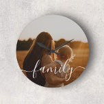 Family Calligraphy Photo Large Clock<br><div class="desc">Crafted with precision and care, our personalized clock boasts a sleek and sophisticated design. The clock face is adorned with a beautifully handwritten script, where the word “Family” takes centre stage. This handwritten script imparts a sense of personal touch and warmth, emphasizing the importance of family bonds.</div>