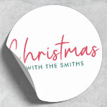 Family Christmas | Modern Minimalist Family Name Classic Round Sticker<br><div class="desc">Simple,  stylish "Christmas with the <your name="">" quote stickers in modern minimalist typography in festive red and green. The design can be easily personalized with your family name(s),  year or own special greeting for super cute bespoke holiday vibes!</your></div>