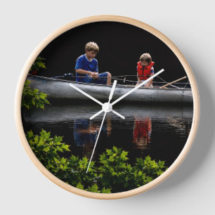 Family fishing scene with brilliant colors clock