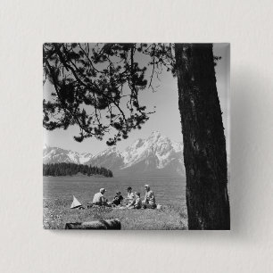 Family having picnic by lake mountains 2 inch square button