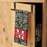 Family Monogram Christmas Holly Kitchen Towel<br><div class="desc">Your initial and last name personalize this kitchen towel with a branches,  berries and greenery pattern on black. Perfect for your home decor or give as a gift. MATCHING items in our store.</div>
