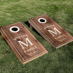 Family Monogram Light Wood Styled Cornhole Set<br><div class="desc">Bold and classy this unique corn hole set features your family monogram and name over a faux light wood backdrop. Inside the top area is a white circle around the holes marking them an extra easy-to-find target for your bean bags. ******* To change the centre monograms use the customization function/edit...</div>