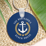 Family Name Beach House Anchor Gold Laurel Navy Keychain<br><div class="desc">A stylish nautical style Keychain with your personalized family name and beach house, lake house, or other desired text and established date. Features a custom designed boat anchor with gold style laurel leaves and a star on navy blue or easily customize the base colour to match your current decor or...</div>