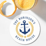 Family Name Beach House Anchor Gold Laurel White Round Paper Coaster<br><div class="desc">A stylish nautical themed set of paper coasters with your personalized family name and beach house, lake house, or other desired text and established date. Features a custom designed boat anchor with gold style laurel leaves and a star on white or easily customize the base colour to match your current...</div>