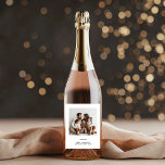 Family Photo & Merry and Bright Minimalistic  Wine Label<br><div class="desc">Make your holiday celebrations extra special with our Family Photo & Merry and Bright Minimalistic Christmas Wine Label. Featuring a clean, modern design with "Merry and Bright" and a space for your favourite family photo, this personalized wine label adds a unique and festive touch to your wine bottles. Perfect for...</div>