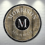 Family Rustic Wood Dartboard<br><div class="desc">This rustic dartboard is the perfect addition to your family beach house, lake house, game room, man cave, and more. It features a bold initial monogram at the centre, with your family name proudly displayed at the top. The bottom reads "Beach House, " but this can be customized to fit...</div>