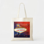 Fancy Twilight Las Vegas Wedding Bridesmaids Gift Tote Bag<br><div class="desc">Fabulous Las Vegas sign and lovely palm tree silhouettes glittering stars red & inky blue background illustrated on custom Bridesmaids Gift Bags. Create super gorgeous and unique gifts for your special bridesmaids by customizing the bag one by one! ((You can find the matching wedding essentials & favours in this store,...</div>