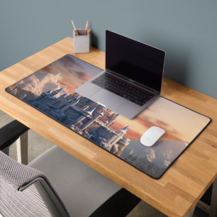 Fantasy digital castle in the mountains desk mat