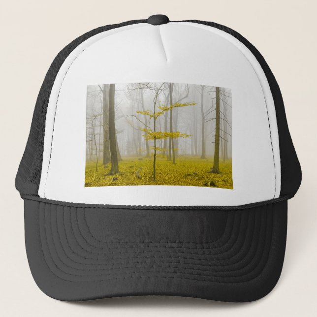 Fantasy forest with fog and yellow leaves trucker hat (Front)