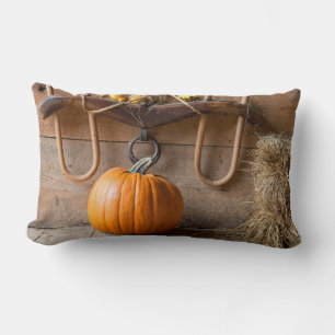 Farmers Museum. Pumpkin in barn with bale of hay Lumbar Pillow