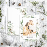 Farmhouse Christmas Greenery Photo Holiday Card<br><div class="desc">Introducing our new Farmhouse Christmas Greenery Photo Holiday Card! This beautiful card features your favourite vertical (portrait orientation) photo, perfectly arranged with a modern, loose arrangement of winter greenery watercolor cotton bolls frame. It's easily personalized, and all text fields can be edited to suit your needs. This holiday card is...</div>