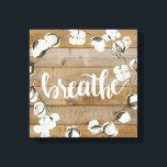 Farmhouse Inspiration - Breathe Canvas Print<br><div class="desc">Farmhouse Inspiration II by Jennifer Paxton Parker. Features the word "Breathe" in cursive alongside a cotton wreath and wood plank background.</div>