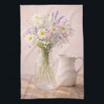 Farmhouse Wildflower Jar and Ceramic Pitcher  Kitchen Towel<br><div class="desc">This farmhouse wildflower kitchen towel features a soft bouquet of daisies, lavender, and delicate pink flowers arranged in a clear glass jar beside a classic white ceramic pitcher. The warm rustic wooden table and gentle natural lighting create a peaceful cottage inspired scene. Perfect for farmhouse kitchens, dining rooms, bedrooms, or...</div>