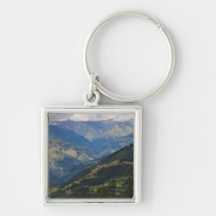 Farmlands and village in the Himalayas Keychain
