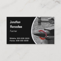 Farrier holding a hot horseshoe with pincers