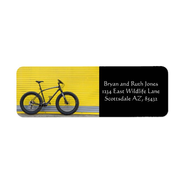 Fat bike on yellow wall (Front)