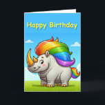 Fat Rhinoceros Birthday Card<br><div class="desc">A fat rhinoceros is what happens to Unicorns when they get old and let them self-go. A cartoon image of a Fat rhinoceros with a horses tail in rainbow colours and a rainbow-coloured wig, standing in a green field with blue sky and the message “Happy Birthday” in yellow in a...</div>