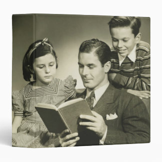 Father Reading to Son Binder