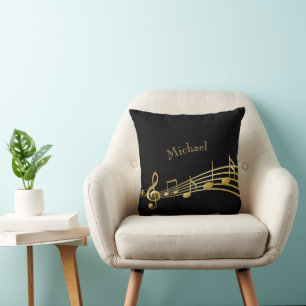 Faux gold music notes on black background throw pillow