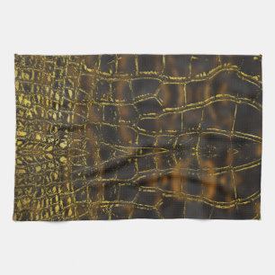 Faux gold snake skin texture on dark marble kitchen towel