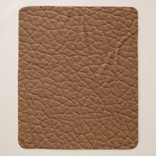 Faux leather light brown shades major texture. abs sherpa blanket
