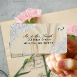 Faux Satin And Lace Wedding Label<br><div class="desc">Get your wedding anniversary invitations noticed with these off-white faux satin and white lace look return address labels.  Faux lace on upper left and lower right corners with silver ring bands in upper right corner,  one silver band with a faux diamond.</div>