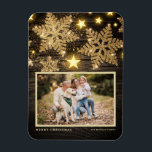 Faux Wood Gold Glitter Snowflakes Photo Christmas Magnet<br><div class="desc">Celebrate the holiday spirit with our customizable photo Christmas magnet! Perfect for capturing your favourite festive moments, this magnet allows you to create a unique keepsake that showcases your family’s joy and love during the holiday season. It features gold glitter snowflakes and stars on a faux wood background. Personalize by...</div>